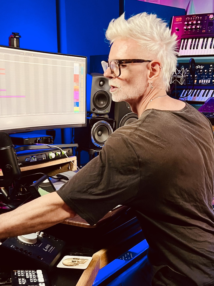 D. Ramirez in his music studio, using his Prism Sound Titan Converter.
